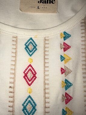 Embroidered Ivory Top with Colorful Geometric Stitching